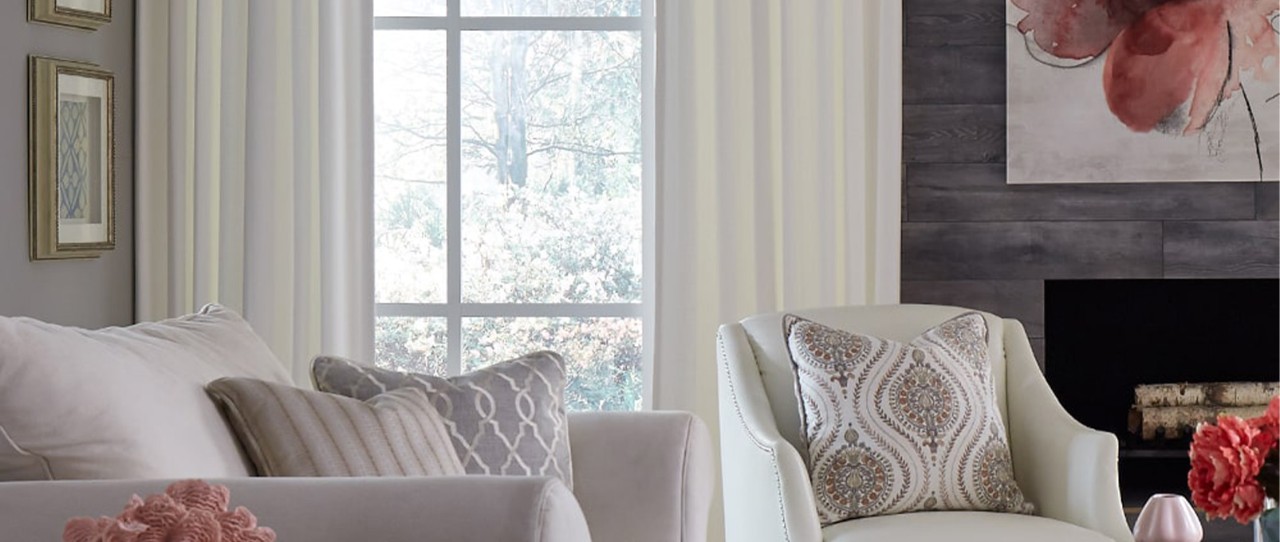 Living room featuring Carole Fabrics Drapery Regal Touch  Color: Cream